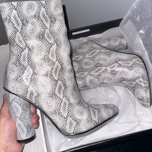 Women’s snake skin bootie heel size 7.5 . Only worn once, great condition